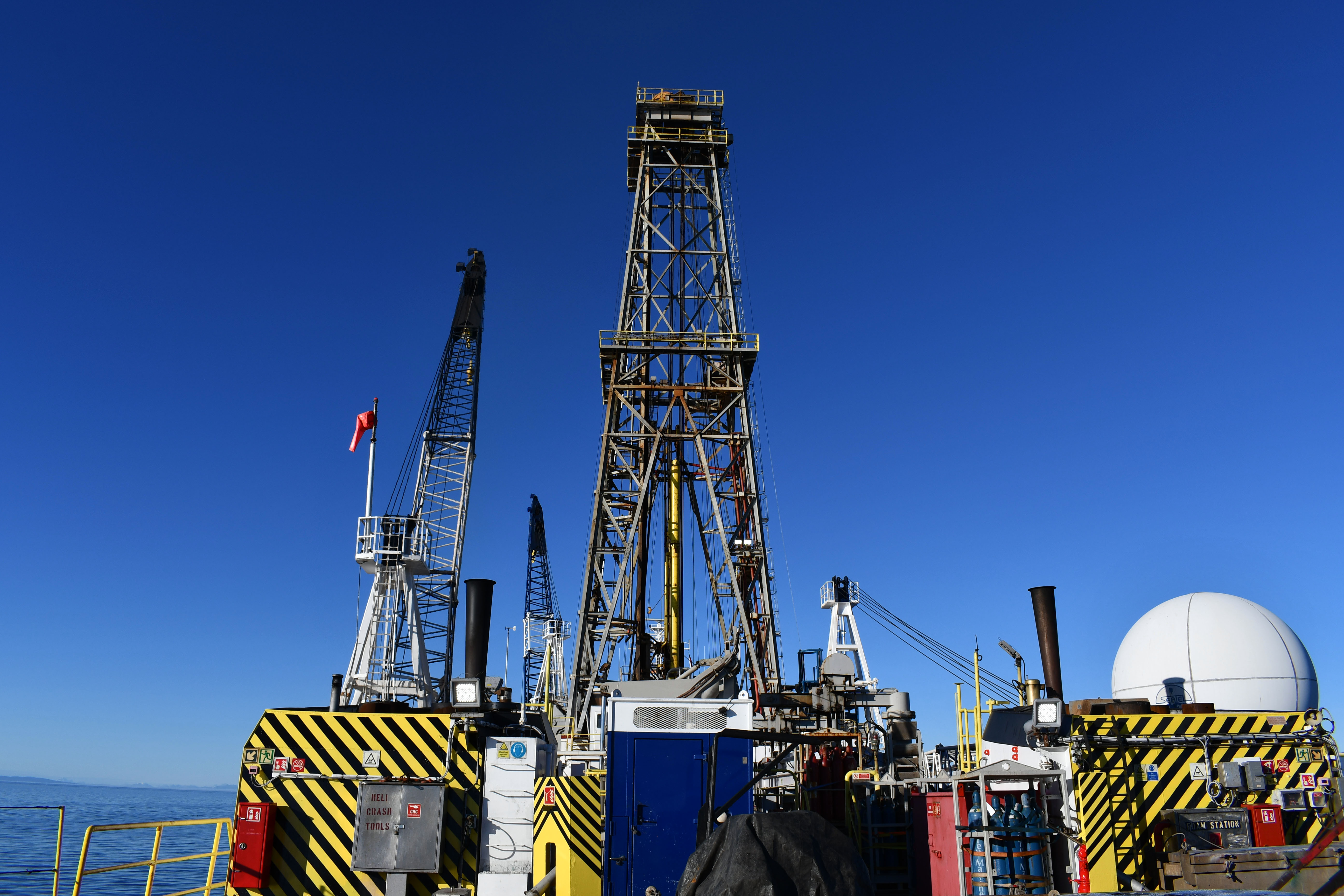 View from the ship's aft showing the towering derrick and cranes