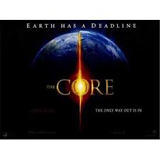 A movie poster for the 2003 movie, The Core. It shows a shadowed Earth on a black background. The words "The Core"  are laid over the Earth, with the O placed over the center of the Earth and it up in flames. The top of the poster says "Earth has a deadline" and the bottom says "the only way out is in."