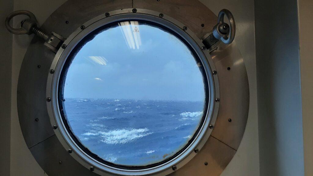 stormy sea through a porthole