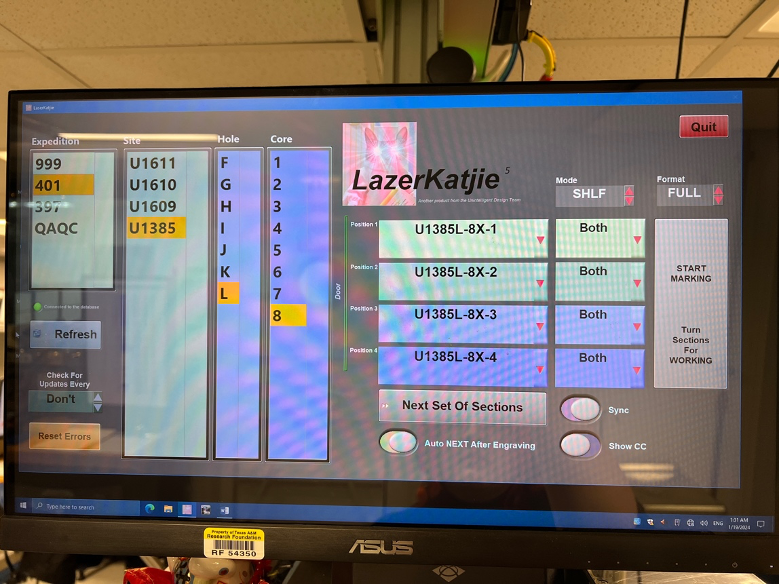 A photo of the working screen of the laser engraver. It shows the expedition, site, hole, and core number. It also shows the example of what the label will engrave as. At the top there is a picture of a cat in a nurses outfit with lasers for eyes with large black text that reads "LazerKatjie"